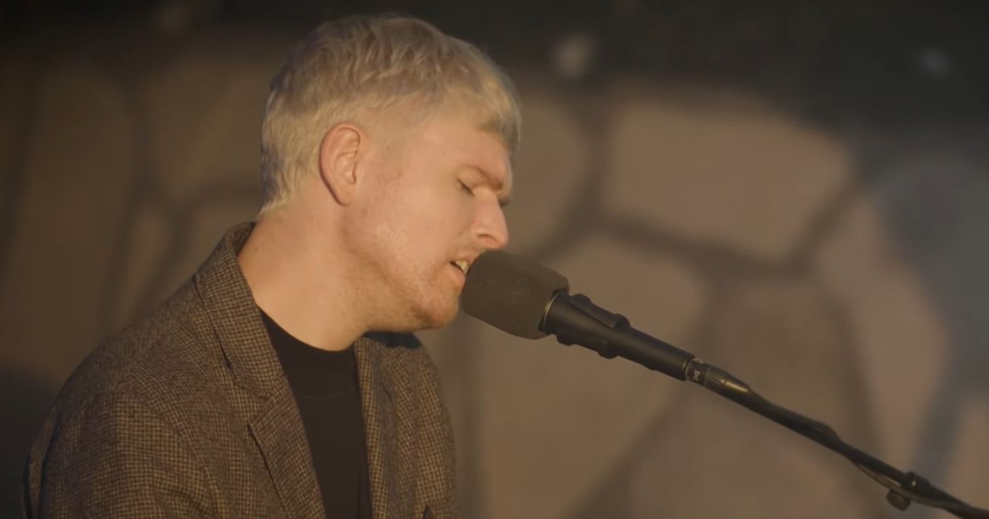 Singer James Blake performing The First Time Ever I Saw Your Face